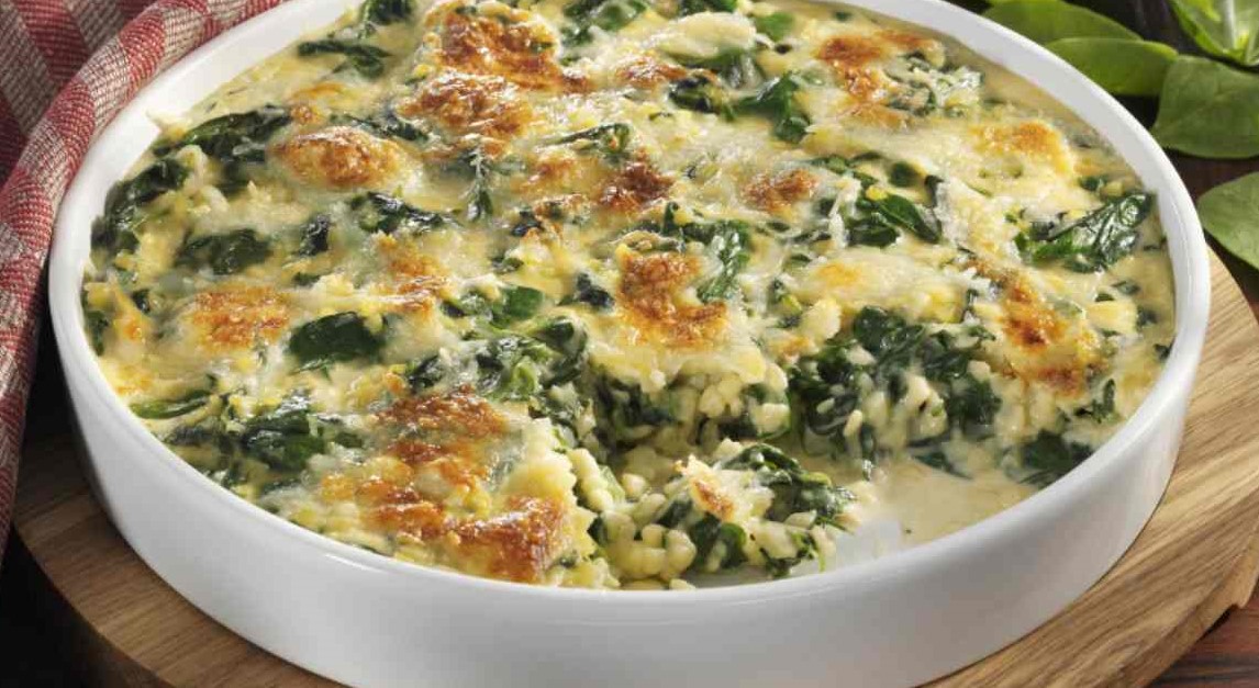 Risotto con spinaci e formaggio al forno