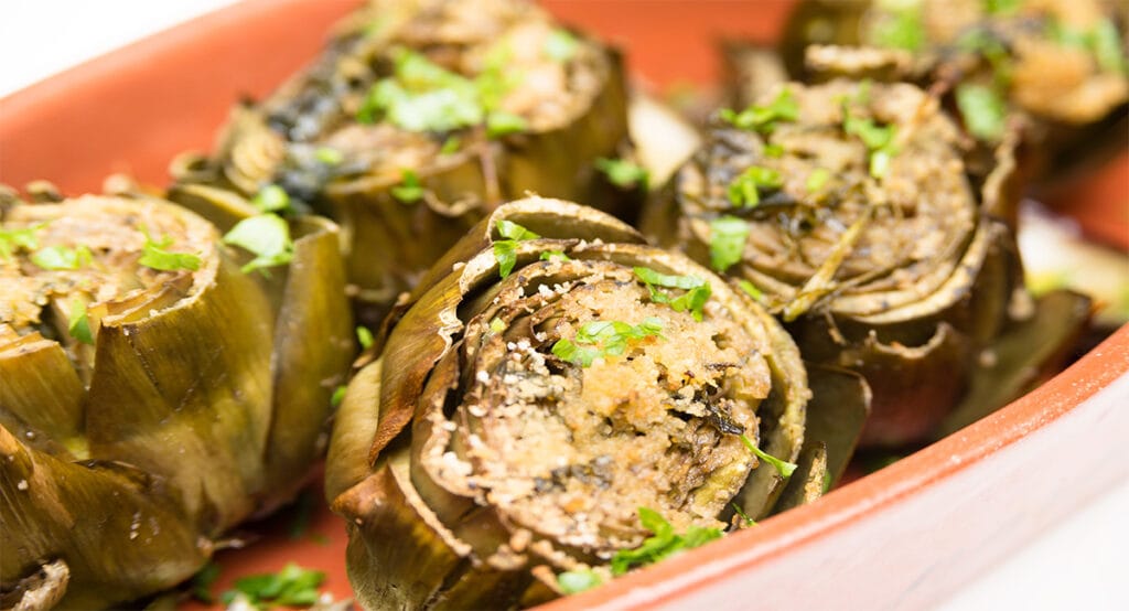 Carciofi gratinati con ripieno vegan, poco calorici e buonissimi. Solo 170 Kcal!