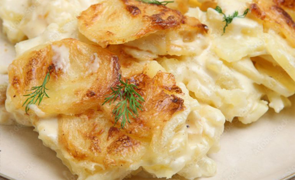 Le patate del fornaio: un gratin saporito fatto con patate sottili e croccanti. Solo 170 Kcal!
