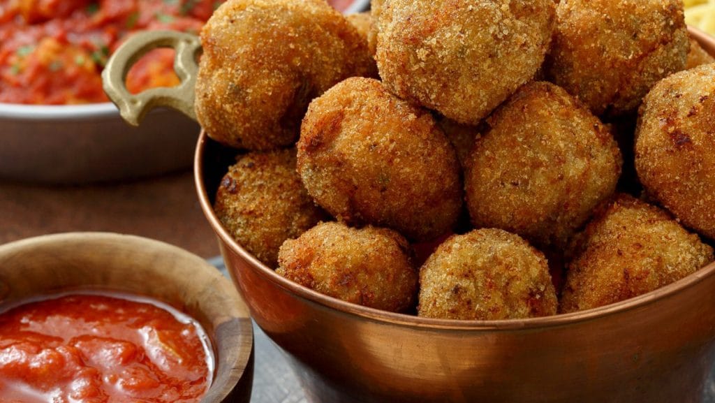 Preparate l’impasto e fate le polpette di carciofi così; sono saporitissime. Solo 60 Kcal!