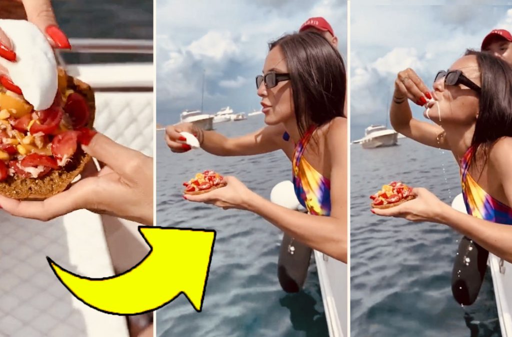 Mangia una fresella bagnata nell’acqua di mare durante una gita in barca: scoppia la polemica!