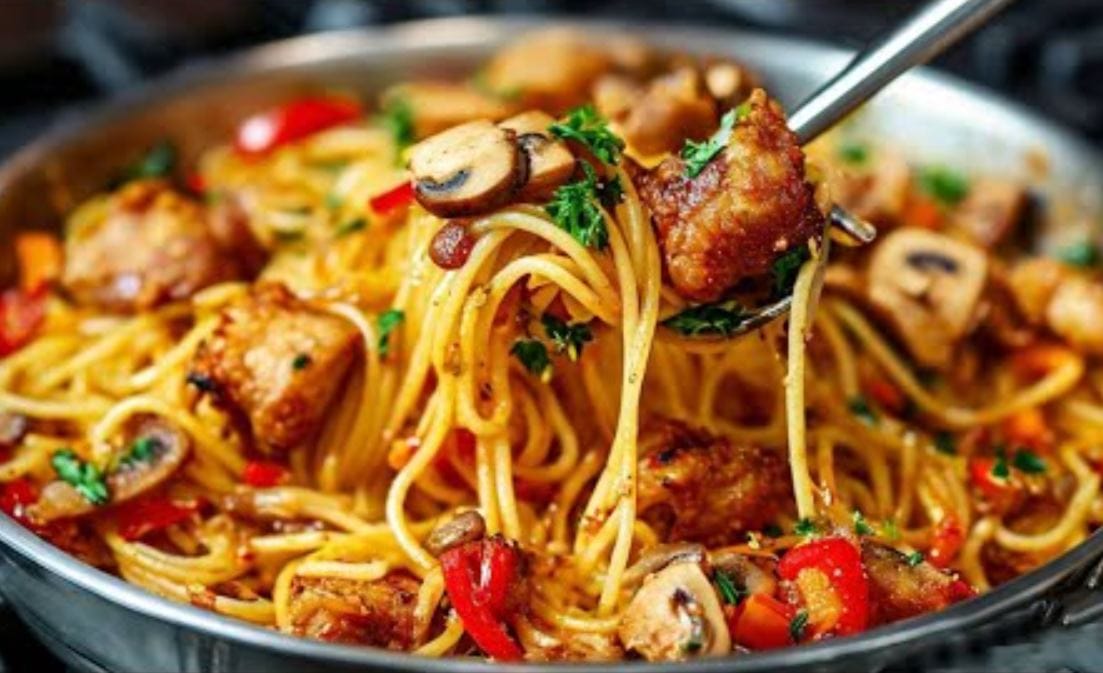 Spaghetti ai funghi e pollo