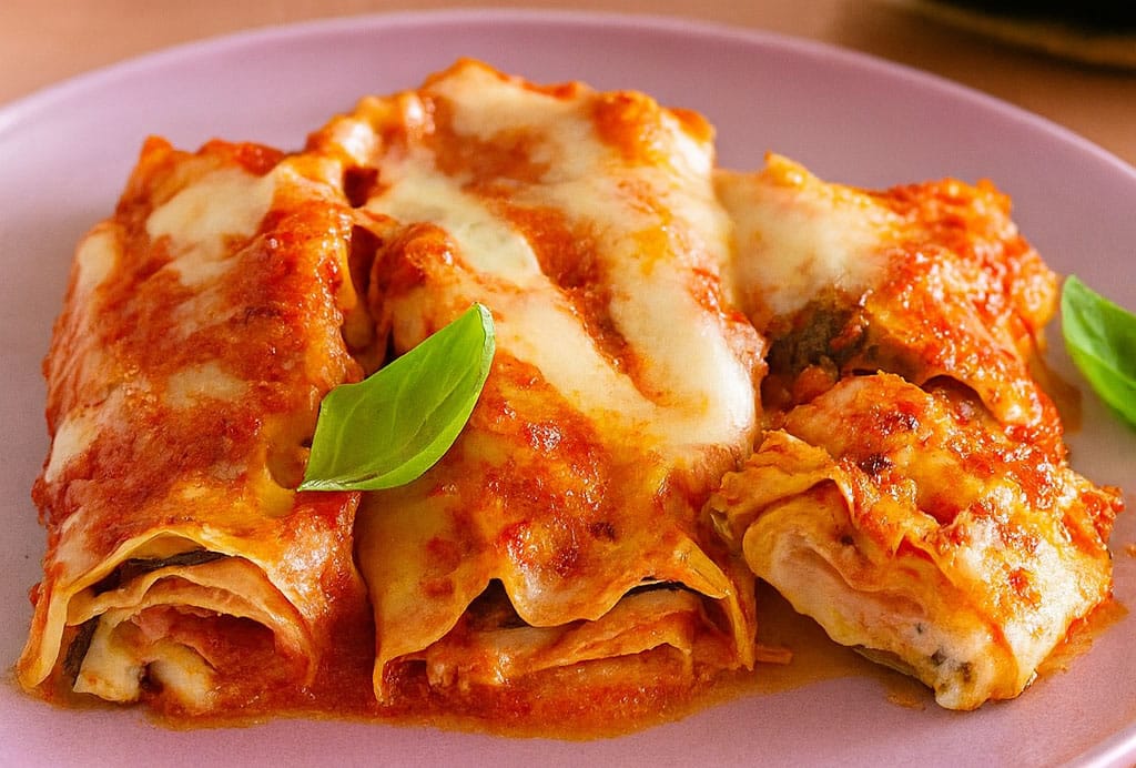 Non è la solita pasta al forno: questi cannelloni di melanzane sono ricchi, cremosi eppure equilibrati: buoni anche per chi vuole restare in forma!