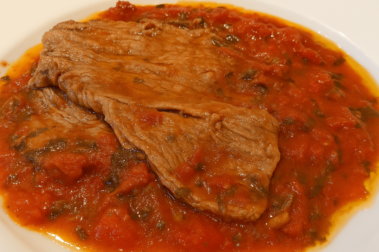 Carne alla pizzaiola