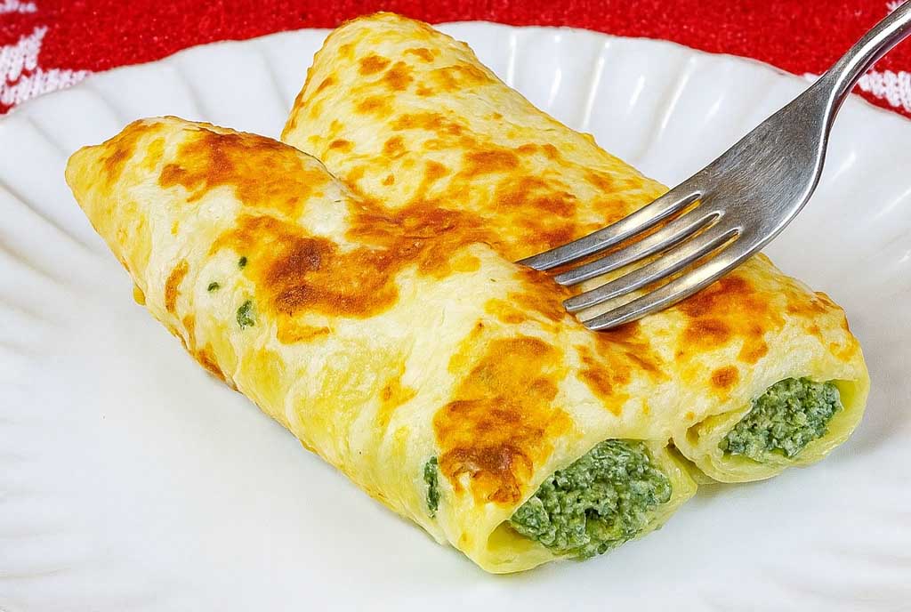 Il primo piatto che non manca mai sulla mia tavola delle feste: cannelloni ricotta e spinaci, semplici ma irresistibili