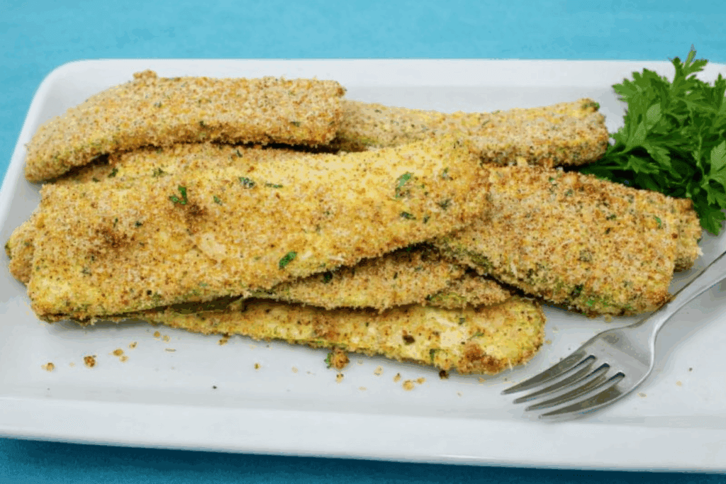Non le friggo più le zucchine impanate al forno, il risultato è stato croccante e molto più leggero del fritto: sono la mia soluzione preferita a dieta!