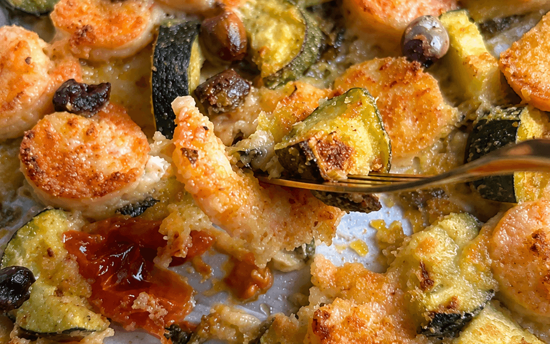 Gamberetti e zucchine in teglia